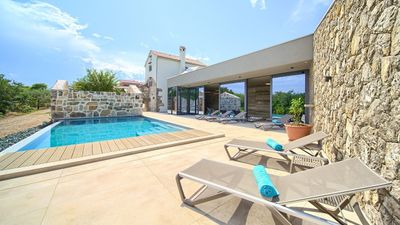 Stone villa Jerini House with an outdoor pool