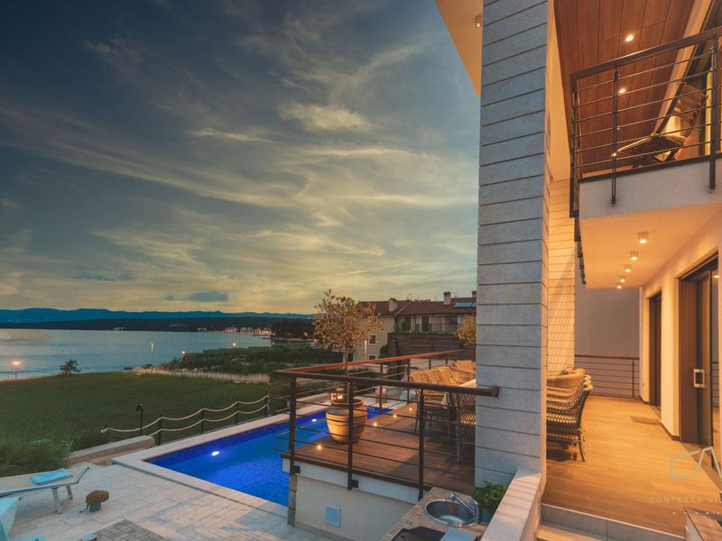 Beachfront Villa Marconica with a sea view and a pool on Krk