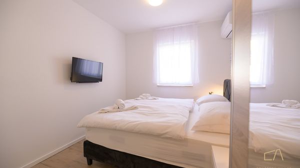 Premium apartment Loma 4 with a pool and garden on Krk