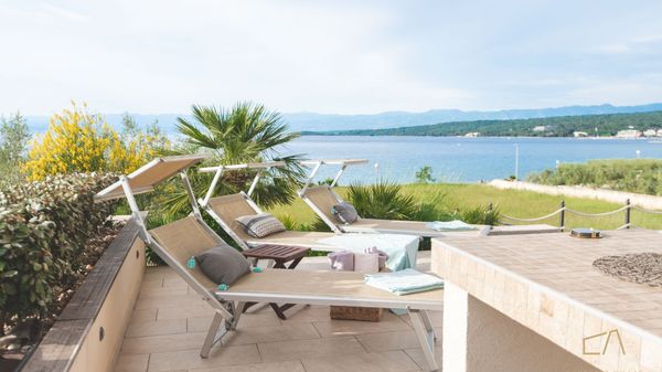 Beachfront Villa Marconica with a sea view and a pool on Krk