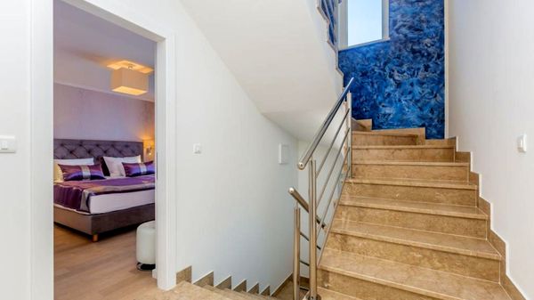 Stone house Villa Roko with a sea view and an outdoor pool on Krk
