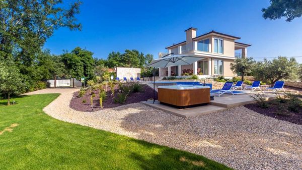 Stone house Villa Roko with a sea view and an outdoor pool on Krk